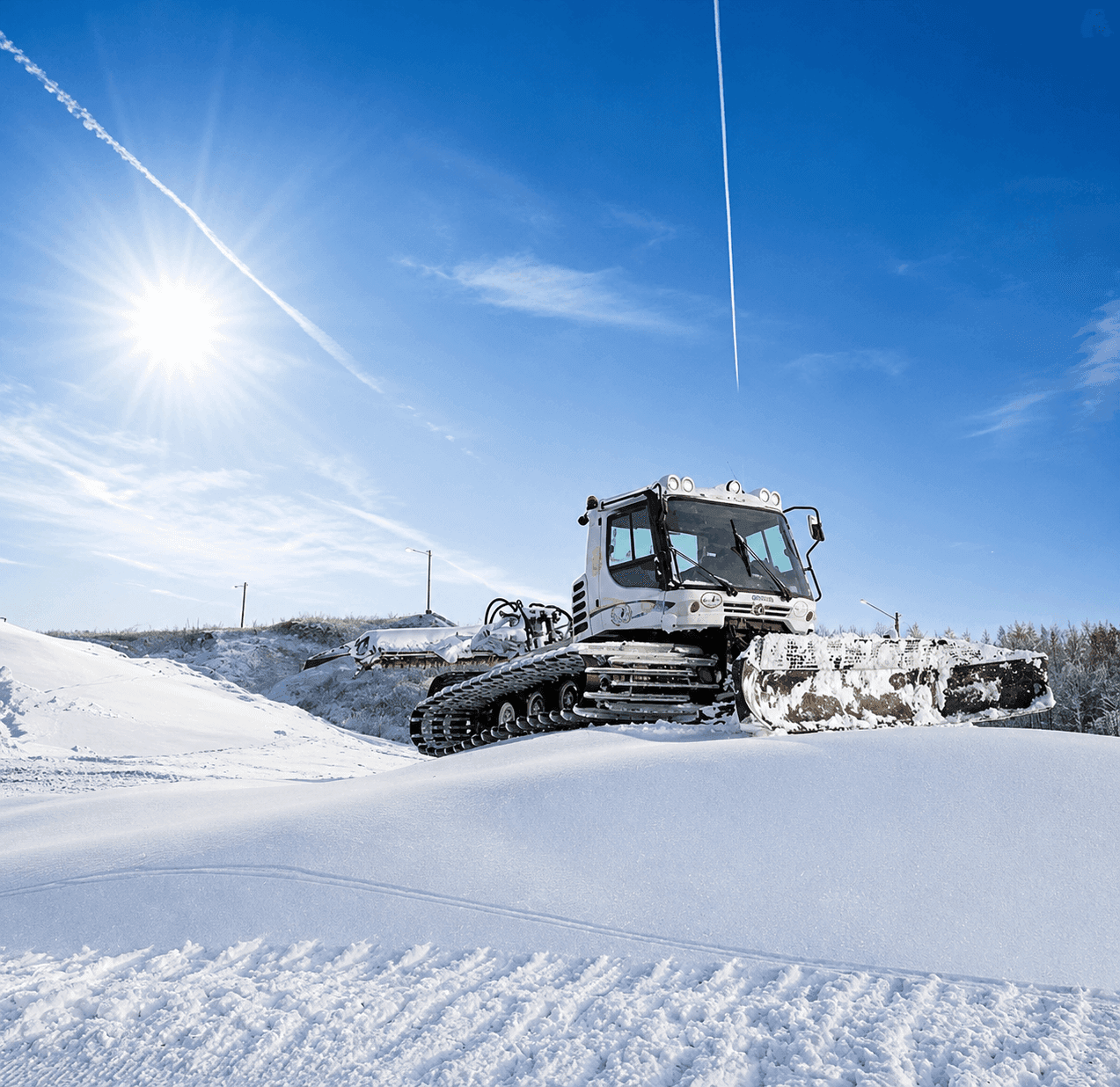 Snow groomer preparing the slope